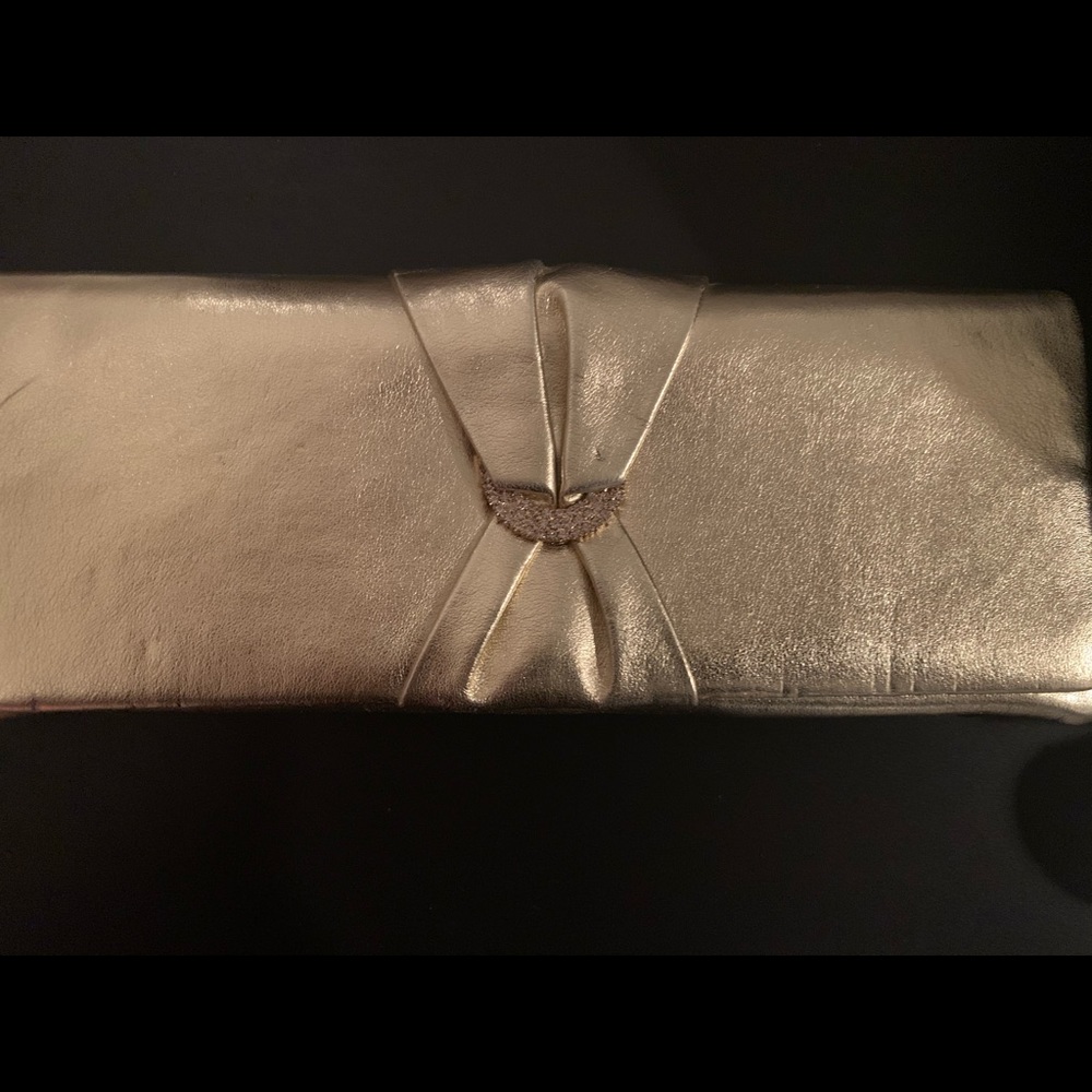 Gold shimmery clutch bag